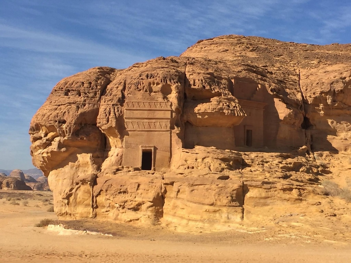 Hegra — two facades, one outcrop